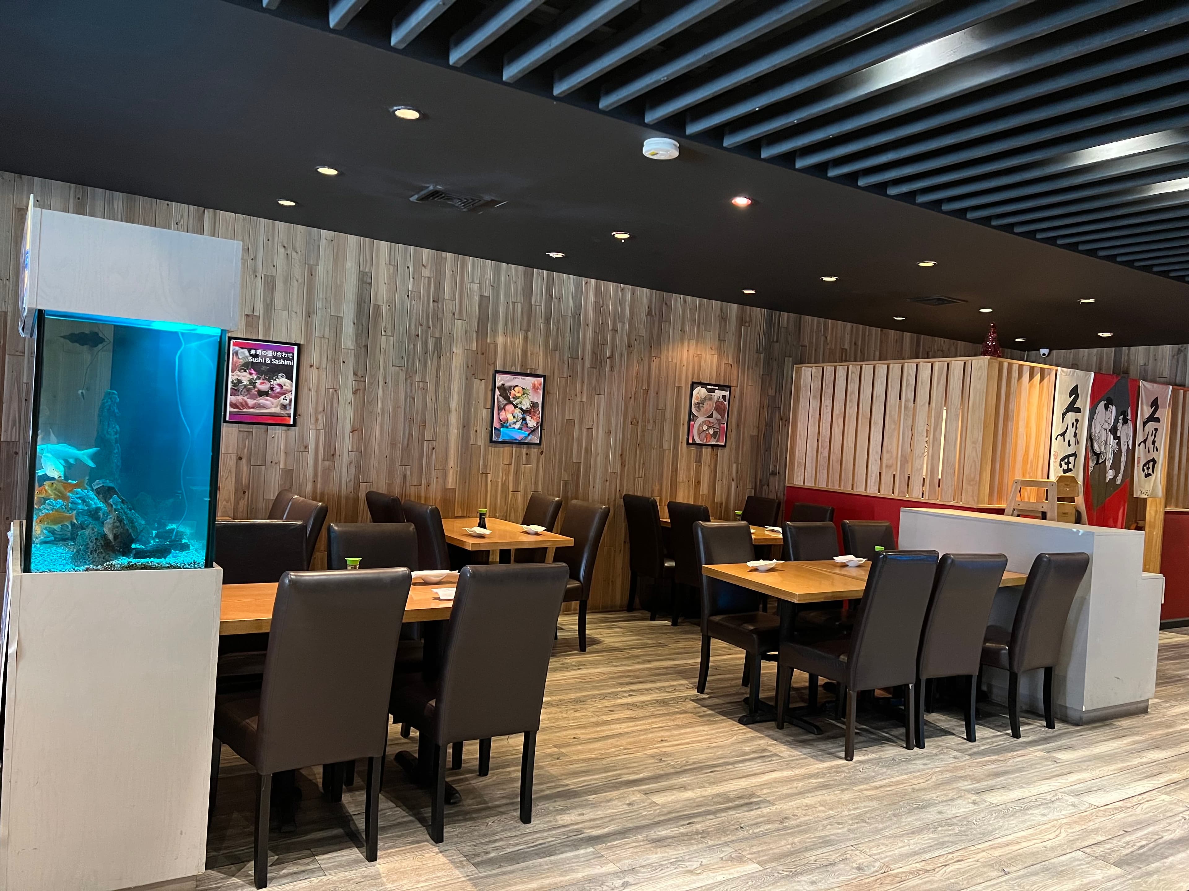 Yahao's dining room with a large aquarium